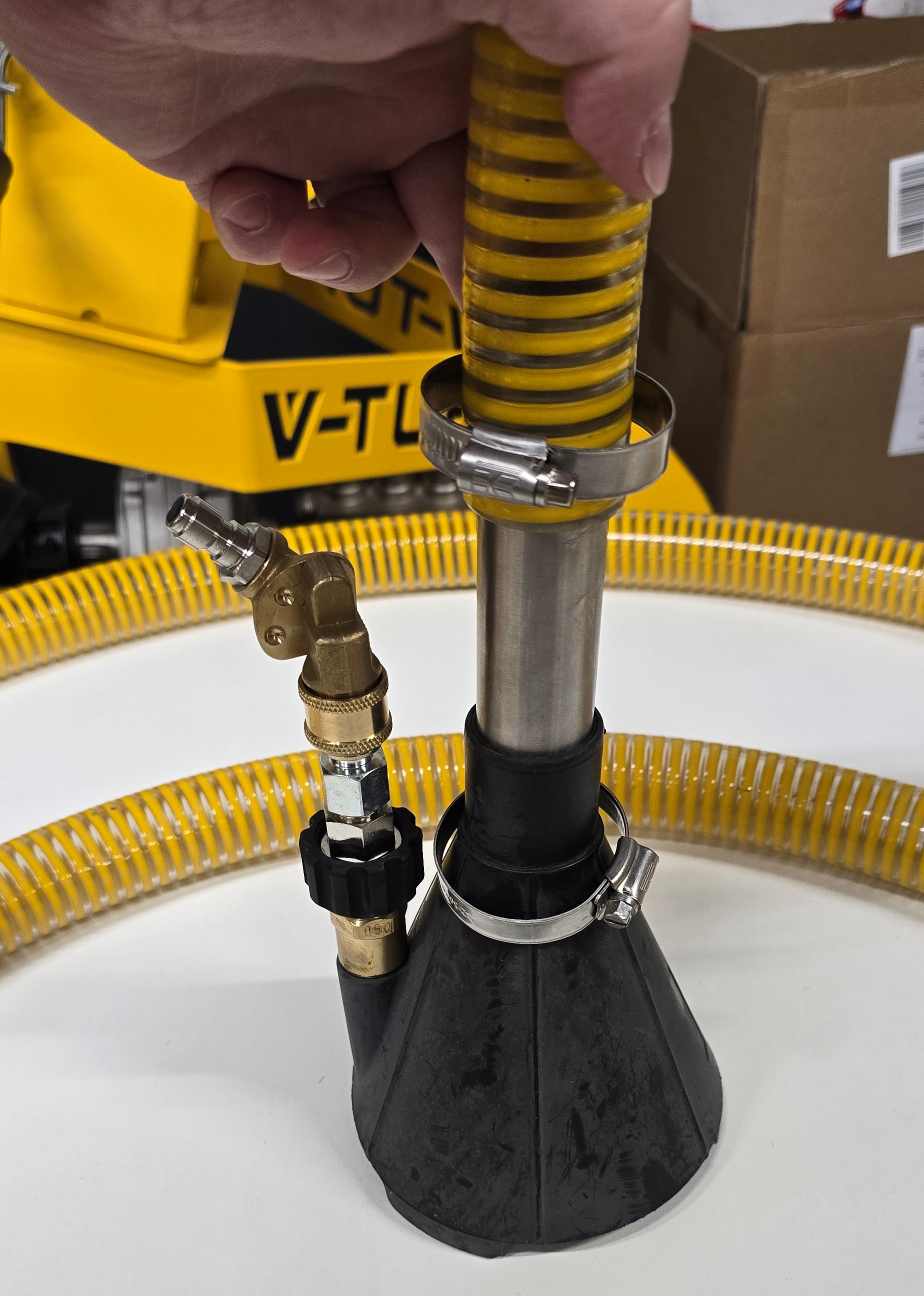V-TUF H5.015 sludge attachment in use showing slurry pumping operation