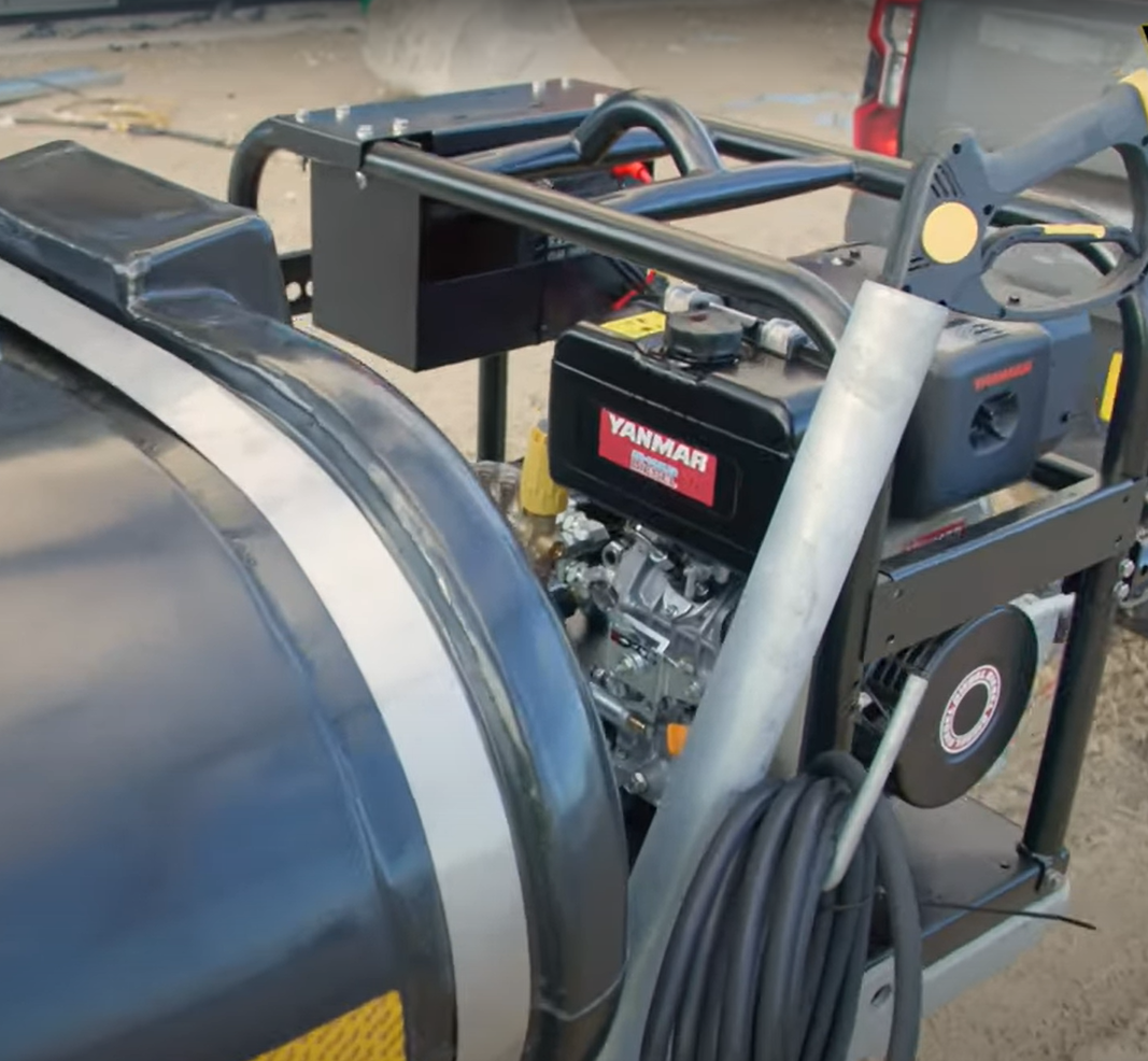 V-TUF DELUGE1125HWTD10GB Yanmar diesel bowser in use showing operator and 200 Bar output