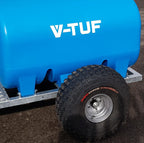 V-TUF DELUGE 700L ATV bowser in use showing pressure washer mounted and hose deployed