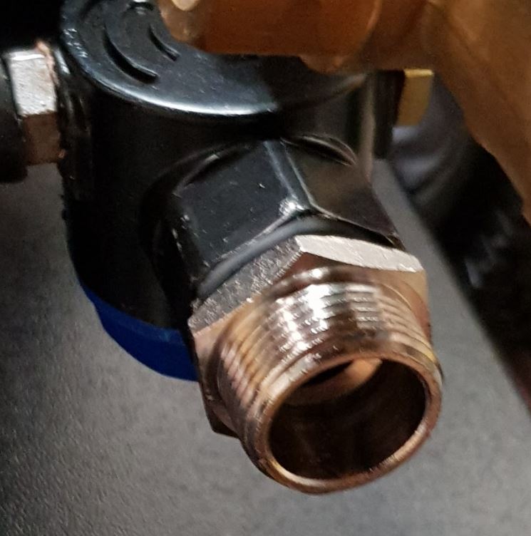 V-TUF BSP adaptor 1/2M to 3/4M installed view showing fitting in use on pipe connection