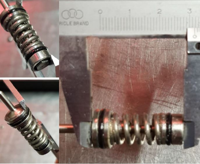 V-TUF SE130 unloader mechanism close-up showing bypass seat and spring assembly